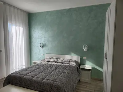 Letto o letti in una camera di Casa Mara