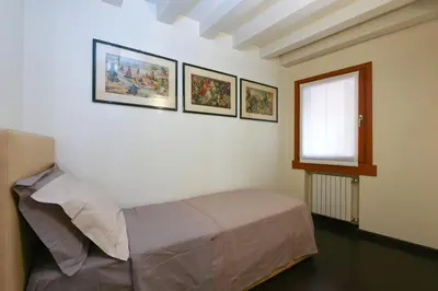 Letto o letti in una camera di Ca' Fenice 1921