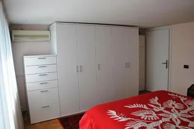 Letto o letti in una camera di La Mansarda più bella e luminosa vicino al centro!