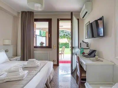 TV o dispositivi per l'intrattenimento presso Borgo Tabari Locazione Turistica