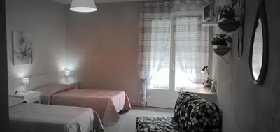 Letto o letti in una camera di Affittacamere Borgo Sabbionara