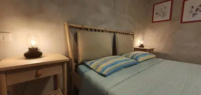 Letto o letti in una camera di Affittacamere Borgo Sabbionara