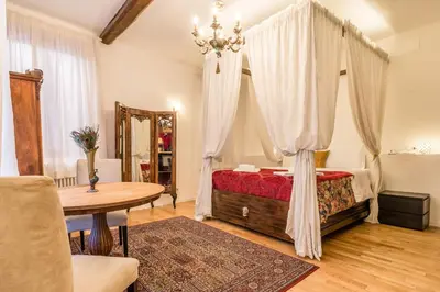 Letto o letti in una camera di Palazzo DaPonte by LionHost