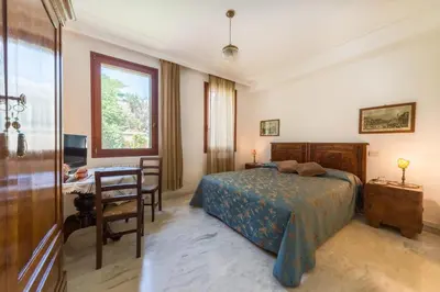 Letto o letti in una camera di B&B Casa Baseggio
