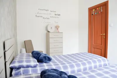 Letto o letti in una camera di Appartamento Ciclamino