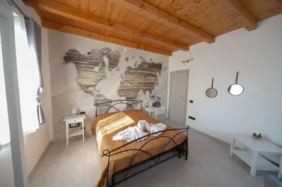 Letto o letti in una camera di Casa Lagunare
