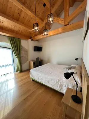 Letto o letti in una camera di NUOVA FILANDA Rooms and More