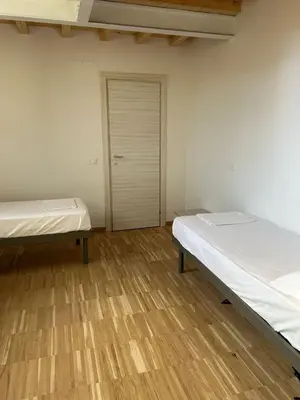 Letto o letti in una camera di Ostello S. Fosca - CPU Venice Hostels