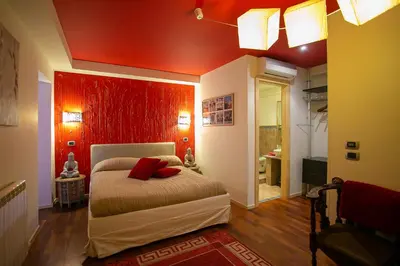 Letto o letti in una camera di B&B La Corte