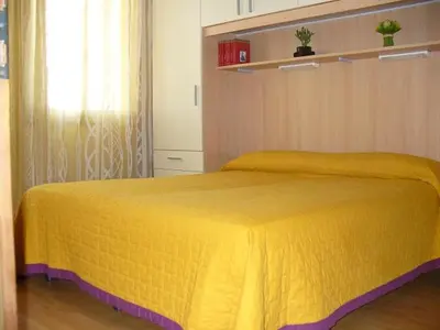 Letto o letti in una camera di Condominio Dorigo