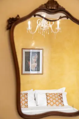 Letto o letti in una camera di Palazzo San Luca