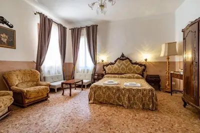Letto o letti in una camera di Queen House Venezia
