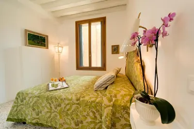 Letto o letti in una camera di Ca' Dorina Luxury