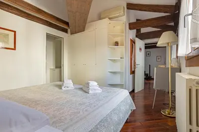 Letto o letti in una camera di Vip Venice Apartments and Rooms Rialto Bridge