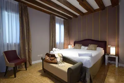 Letto o letti in una camera di Residence La Fenice
