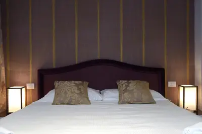 Letto o letti in una camera di Residence La Fenice