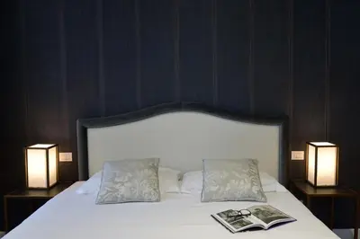 Letto o letti in una camera di Residence La Fenice
