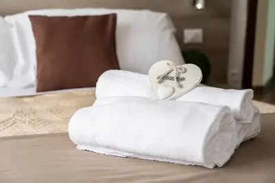Letto o letti in una camera di Internazionale - Family Village
