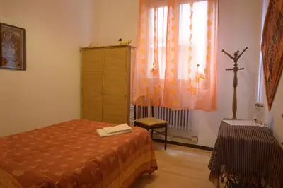 Letto o letti in una camera di B&B Arabesque