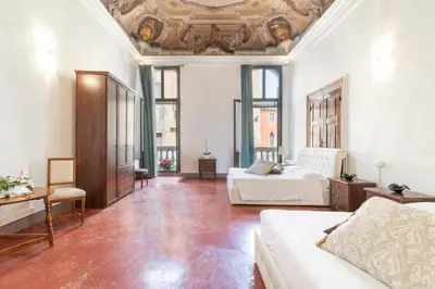 Area soggiorno di Riva Palace Apartments by Wonderful Italy