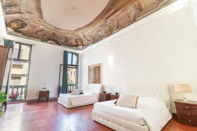 Area soggiorno di Riva Palace Apartments by Wonderful Italy