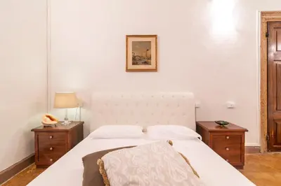 Letto o letti in una camera di Riva Palace Apartments by Wonderful Italy