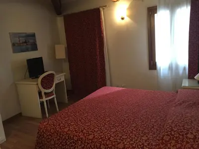 Letto o letti in una camera di Venice Resorts