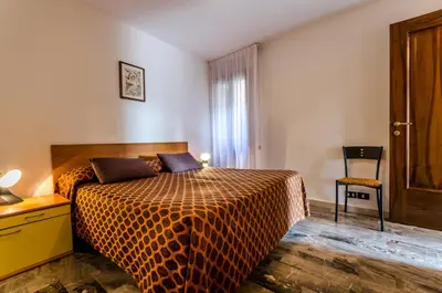 Letto o letti in una camera di Venice Apartments