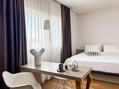 Letto o letti in una camera di Le Nove Hotel