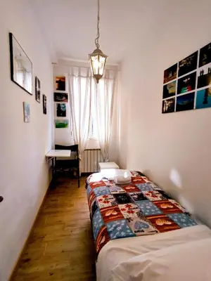 Letto o letti in una camera di LA GUGLIA - Guglia House apartment-CANNAREGIO-VENEZIA