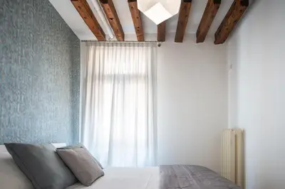 Letto o letti in una camera di Erbaria Boutique Apartment R&R