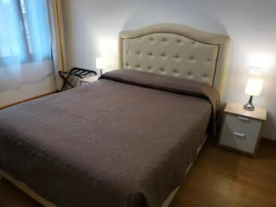 Letto o letti in una camera di San Polo Star