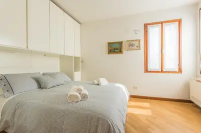 Letto o letti in una camera di Casa Vivian San Marco