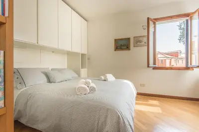 Letto o letti in una camera di Casa Vivian San Marco
