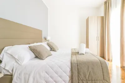 Letto o letti in una camera di Hotel Loreley