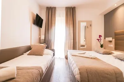 Letto o letti in una camera di Hotel Loreley