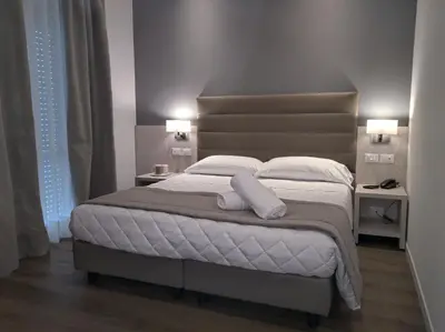 Letto o letti in una camera di Hotel Loreley