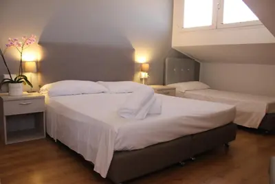 Letto o letti in una camera di Hotel Loreley