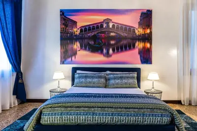 Letto o letti in una camera di Cà Sant`Angelo