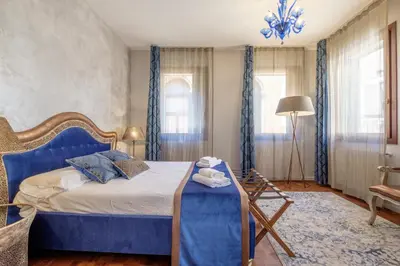 Letto o letti in una camera di Casa Verona
