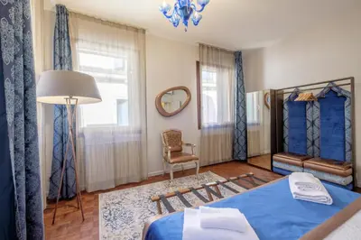 Letto o letti in una camera di Casa Verona