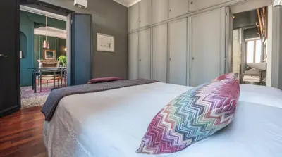 Letto o letti in una camera di Stylish Renovated Apartment In The Heart Of The City