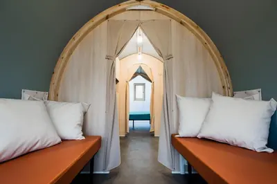 Letto o letti in una camera di GoOutside Venezia