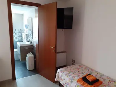 Letto o letti in una camera di B&B Casa Taty