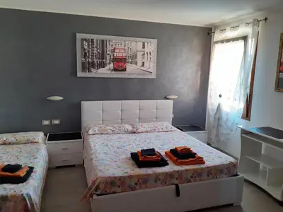 Letto o letti in una camera di B&B Casa Taty