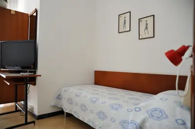 Letto o letti in una camera di Hotel Reno