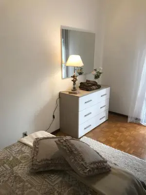Letto o letti in una camera di Casa Martini Abano