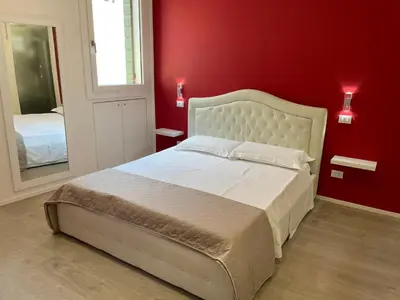 Letto o letti in una camera di A&F Apartment Padova centro storico