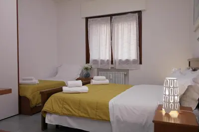 Letto o letti in una camera di Rosa Garden B&B