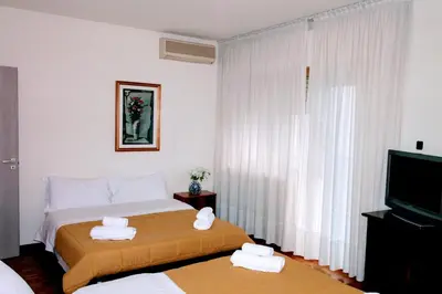 Letto o letti in una camera di Rosa Garden B&B